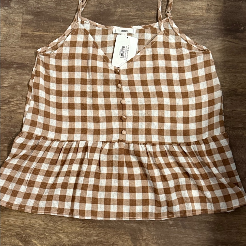 NWT. Mine. Tan and White Checkered Peplum top.